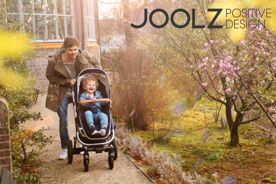 Vader met een Joolz kinderwagen