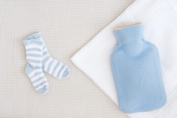 Een kruik voor je baby in bed: waarom en hoe?