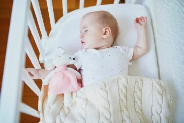 Baby ligt te slapen met goede TOG-waarde