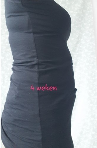 Foto van 4 weken zwanger buik